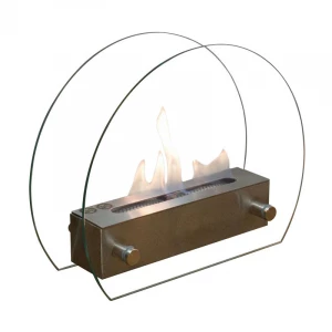 Circular tabletop fireplace wit glass panels on the sides