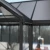 Triomphe 13×15 ft. Greenhouse by Canopia with black frame and clear acrylic walls