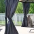 Grey gazebo curtain set installed on Canopia Palermo 3600