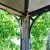 Canopia Martinique 12×16 ft. gazebo with anthracite frame and tinted polycarbonate roof