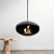 Ceiing-mounted bioethanol fireplace Cocoon Aeris Black with steel mounting rod