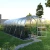 Baumera KLASIKA Arkinis greenhouse with arched galvanised frame and polycarbonate panels