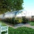 Baumera KLASIKA Tube greenhouse with arched galvanised tubular frame and polycarbonate panels