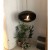 Ceiing-mounted bioethanol fireplace Cocoon Aeris Black with steel mounting rod