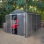Canopia Rubicon Shed 185 × 378.5 cm (6 × 12 ft) on white background – dark grey panels, skylight roof, aluminium frame
