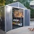 Canopia Rubicon Shed 237 × 229 cm (8 × 8 ft) on white background – dark grey polycarbonate walls, skylight roof, aluminium frame