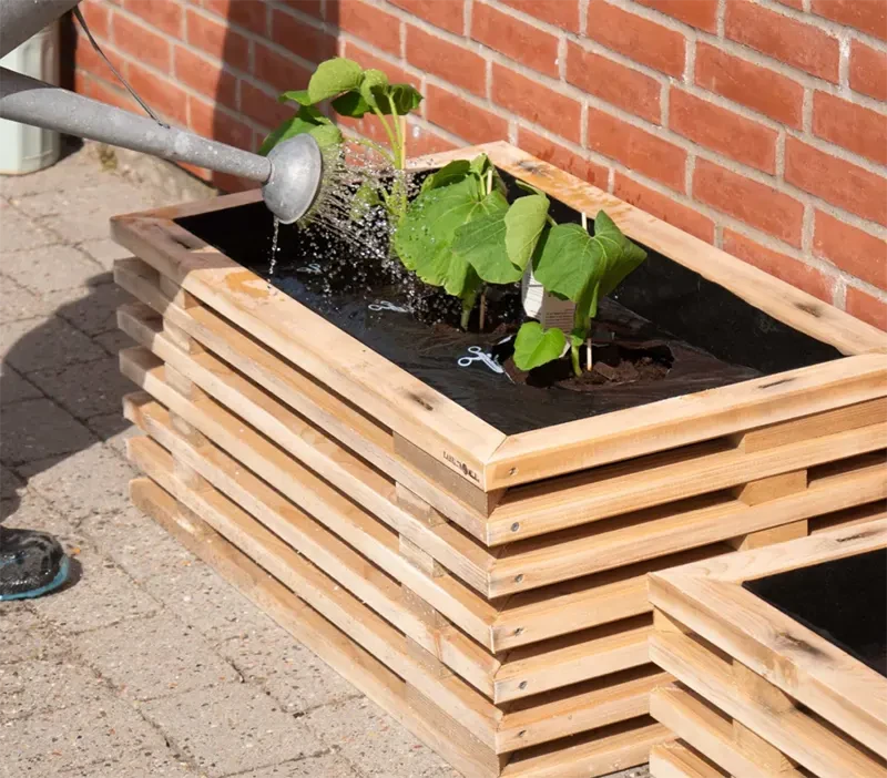 Moveable raised bed for greenhouse in natural wood