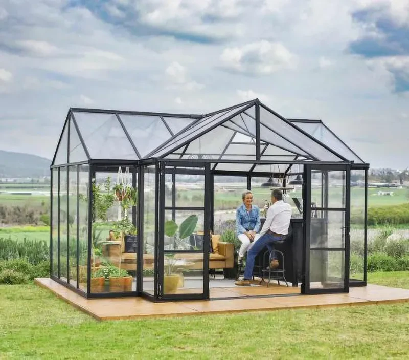T-shaped greenhouse with furnitures and people inside